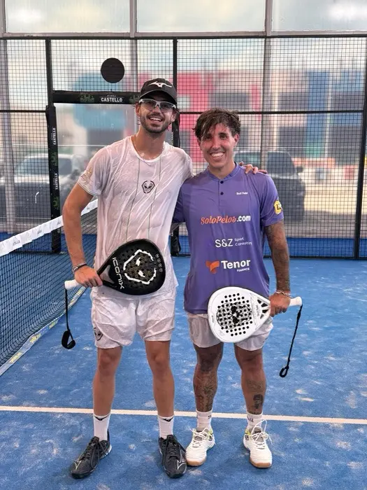 Exequiel Mouriño with his playing partner courtside